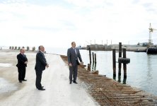 President Ilham Aliyev examines construction progress in 2-4 km section of Baku-Alat highway (PHOTO)